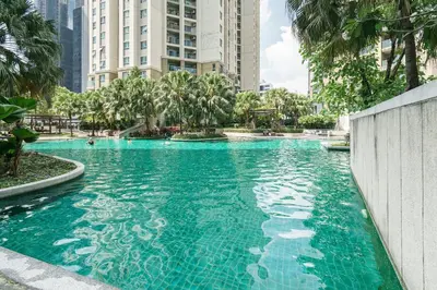 a swimming pool in a city with tall buildings at Internet celebrity train night market swimming pool free WiFi mrt 100m in Ban Tha Satu