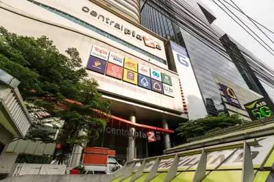 a building with signs on the side of it at Internet celebrity train night market swimming pool free WiFi mrt 100m in Ban Tha Satu