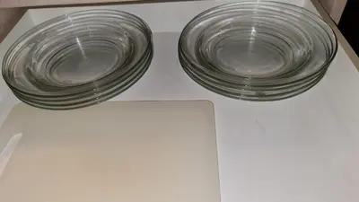 two glass plates sitting on top of a table at 1BR Thonglor , Fast WiFi , Near Samitivej , Nightlife in Khlong Toei