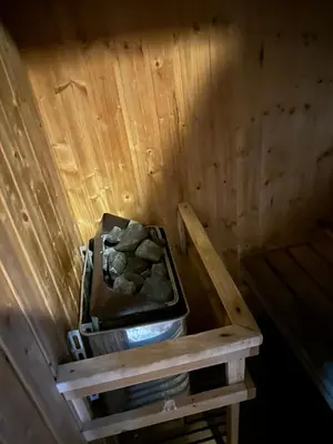 an inside of a wooden room with a box of rocks at interLux Premier Sukumvit , Nana , Bangkok in Bangkok