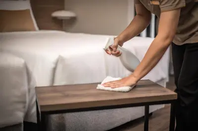 a woman is washing her feet on a table at SAM E Hotel Bangkok Sathorn in Bangkok