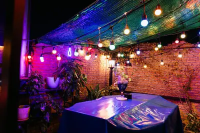 a room with a table with a bunch of lights at New York Loft & Japanese Magic by V4SKIN in Bangkok