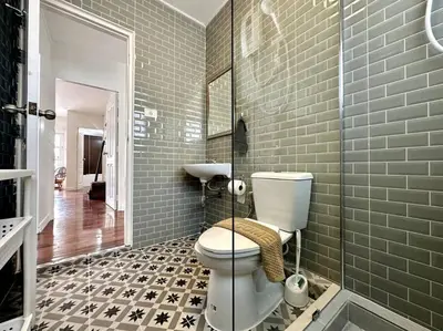 a bathroom with a toilet and a sink at Oasis townhouse in the perfect location in Bangkok