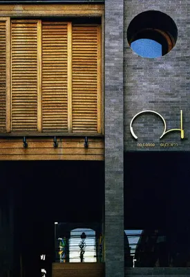a building with a window with a person in it at Na Tanao 1969 in Bangkok