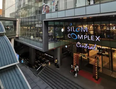 an overhead view of a shopping mall with a sign for a complex at PB home 1 min to BTS Saladaeng & MRT Silom in Bang Rak