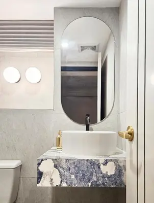 a bathroom with a sink and a mirror at PB home 1 min to BTS Saladaeng & MRT Silom in Bang Rak