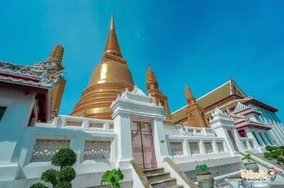 a building with a golden pagoda on top of it at Relax Private terrace&cozy BR,near Grand palace in Bangkok