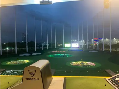 a view of a golf course in a building at The Parkland Condominium in Bangkok