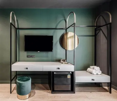 a bathroom with a sink and a mirror at Cher Hostel Bangkok in Bangkok