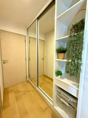 a walk in shower with plants on shelves at Cozy Spacious 1BR 2Bed GardenView 500m BTS Thonglo, Samitivej, SKV49, Rooftop Pool, Fast 500mbps wifi in Bangkok