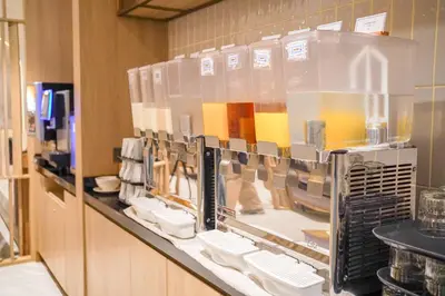a display case in a store with shoes in it at Holiday Inn Express & Suites Bangkok Central Pier by IHG in Bangkok