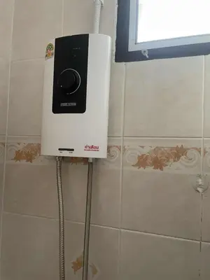 a air conditioner on a wall in a bathroom at Viriyapon2 in Bangkok