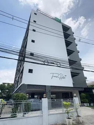 a building with a sign that reads porsche life at OYO 75446 Travis Inthamara 49 in Bangkok