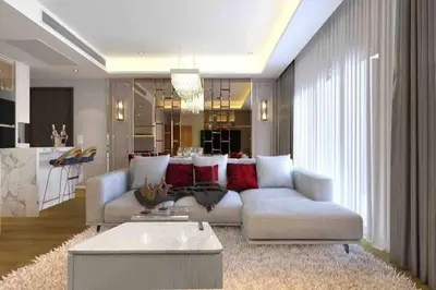 a living room with a couch and a table at 2BedRoom-BestLocationBangkok-Emquartier-Metro-PhromPhong in Bangkok