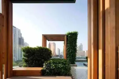 a view of a city from a window in a building at 2BedRoom-BestLocationBangkok-Emquartier-Metro-PhromPhong in Bangkok