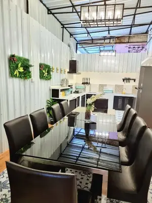a conference room with a glass table and leather chairs at k4 be chill *Wongwianyai BTS_80m*Family&Friend* in Godown