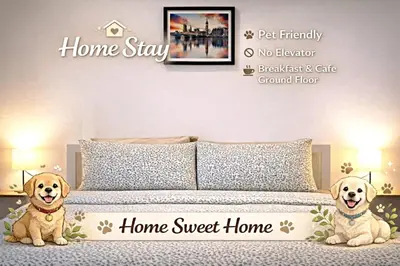 a bedroom with a bed with two dogs sitting on it at homey stay and cafe by hematoa in Bangkok