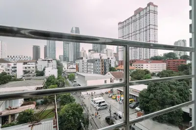 a view of a city street from a window at Tori crown hotel in Bangkok