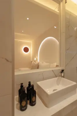 a white bathroom with a sink and a white sink at CORRIDOR 2407 in Bangkok