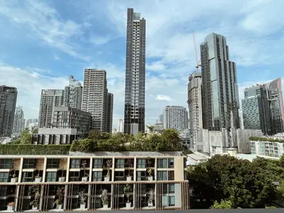 a view of a city skyline with a building at Luxurious Downtown condo w/train access in Bangkok