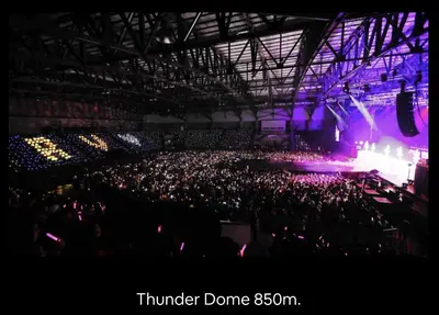 a crowd of people in an auditorium at a concert at 55th AREA in Nonthaburi