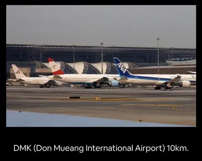 a group of airplanes parked on the runway at an airport at 55th AREA in Nonthaburi