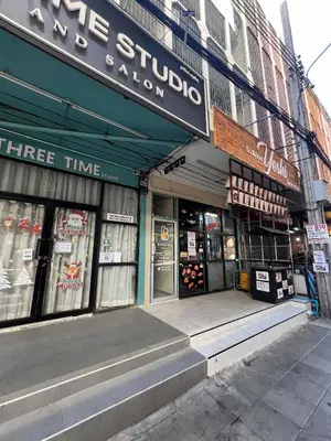 a store on the corner of a street at Bangwa House - MRT Bangwa Station in Bangkok