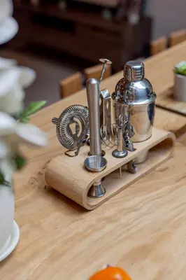 a wooden tray with food items on a table at Chic loft in Bangkok