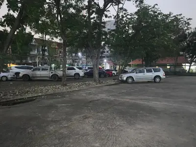 a group of cars parked in a parking lot at Baan Sood Soi Residence 1 บ้านสุดซอย เรซิเด้นท์ 1 in Ban Bang Bamru