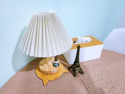 a lamp on a table next to a lampost with a lampost at 814-STP Homely room Free Wi-Fi and Near BTS line in Bangkok