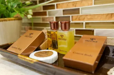 a tray with two bottles of perfume on a counter at The Prestige Nana in Bangkok