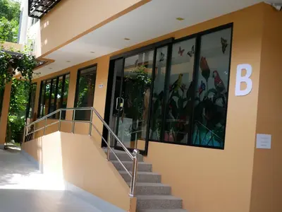 a building with a staircase in front of a building at ศิวพฤกษ์ เพลส in Nonthaburi