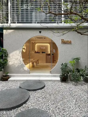a store front with a round window in a building at Rema residence China town Main Road in Bangkok