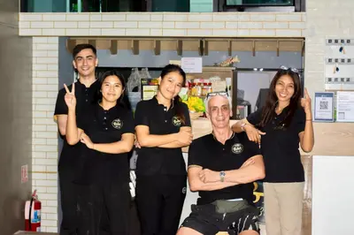 a group of people posing for a picture at 829 Backpack Bangkok BM B&B in Bangkok