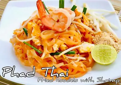 a plate of food with shrimp and other foods at Travel Bangkok BM B&B in Bangkok