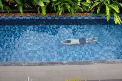 a model of a fish in a swimming pool at Bangkok Luxury Pool Villa Thonglor in Bangkok