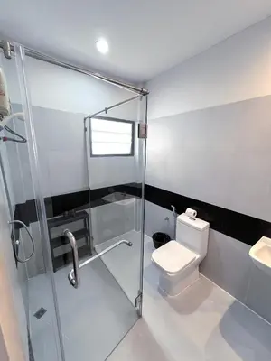 a bathroom with a shower and a toilet at Single house 4BR parking and kitchen in Sukhumvit49-1 in Bangkok