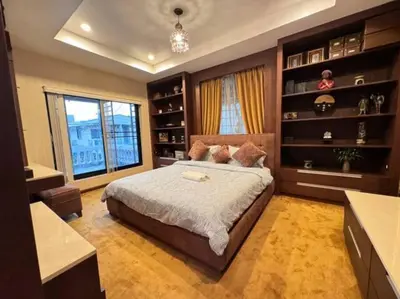 a bedroom with a large bed and a window at \u66fc\u8c37\u72ec\u680bLat Phrao\u7cbe\u54c1\u522b\u5885 in Bangkok