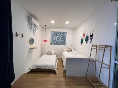 a room with two beds and a ladder in it at Roof Top 4BR Top Private Floor, china town, center in Bangkok