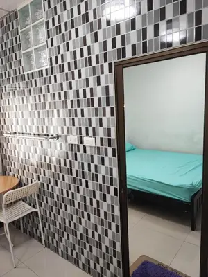 a room with a mirror and a bunk bed at Mansion 24 in Bangkok