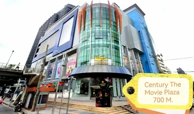 a building with a sign in front of it at NEW! KG home 3 Bedrooms/ Free Wi-Fi in Bangkok