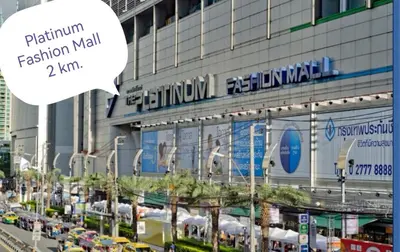 a busy city street with a large building at NEW! KG home 3 Bedrooms/ Free Wi-Fi in Bangkok