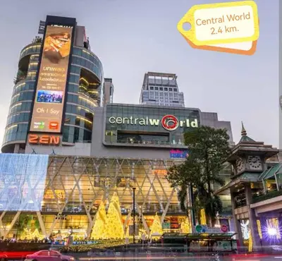 a large building with a sign in front of it at NEW! KG home 3 Bedrooms/ Free Wi-Fi in Bangkok