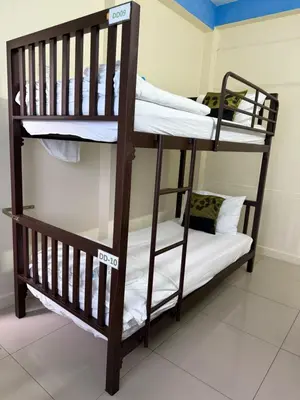 a couple of bunk beds in a room at Greenhouse Bangkok Khaosan in Bangkok