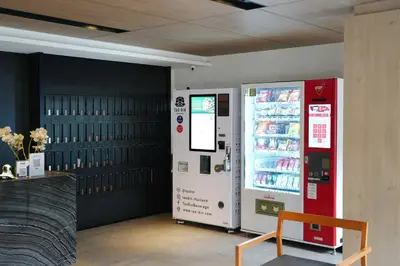 a vending machine in a store with a refrigerator at Circle Rein Sukhumvit 12 two bedrooms apartment in Khlong Toei