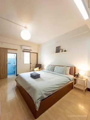 a bedroom with a large bed in a room at 206HiddenNest, Local Room with Street Food only 15 min walk to Skytrain in Bangkok