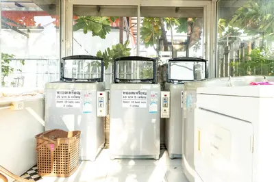 a row of water heaters sitting in a room at Kiatthada Resort in Bangkok