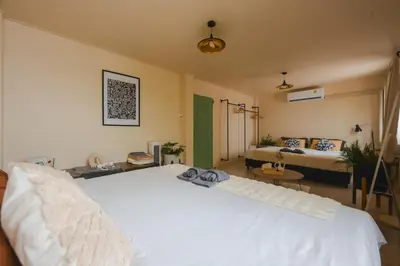 a bedroom with a large white bed in a room at Private house 4bedrooms at Thonglor 4bath5toilet 10people in Bangkok
