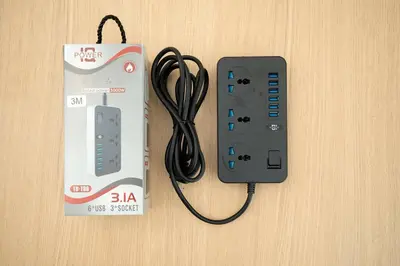 a nintendo wii game controller next to a box at Townhouse in Pratunam Bangkok in Bangkok