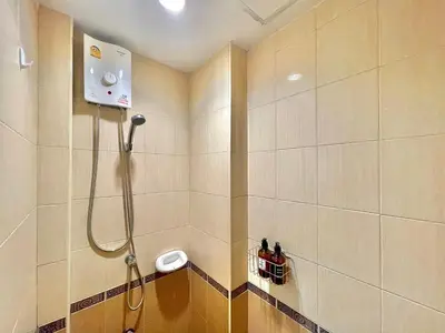 a bathroom with a shower with a sink and a toilet at S52 Near On nut BTS 300m*7-11 in Phra Khanong